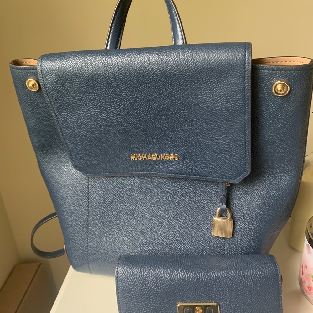 Navy blue Michael Kors purse/mini backpack with matching Michael Kors wallet